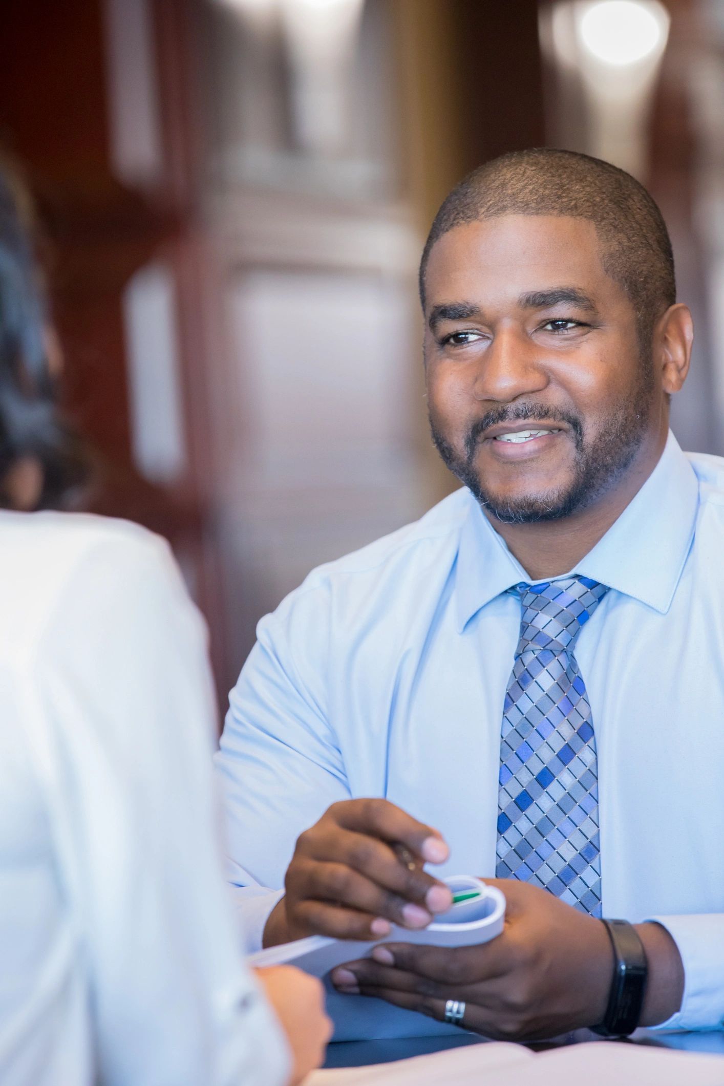 Financial advisor speaking with a client